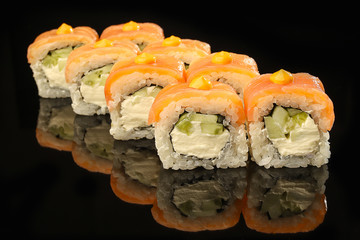 Philadelphia roll sushi with salmon, avocado, cream cheese. Japanese food