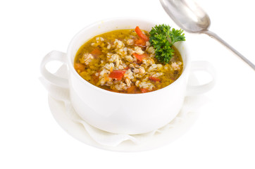 Bowl with rice soup and vegetables isolated on white background