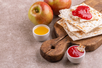 Traditional Jewish kosher matzo with apples, jam and honey