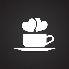 Cup with hearts on black background icon