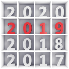 New Year concept: number symbols placed on square book shelf