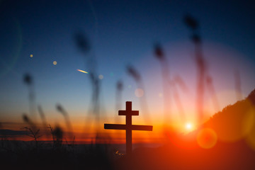 Orthodox cross against the sunset sky.