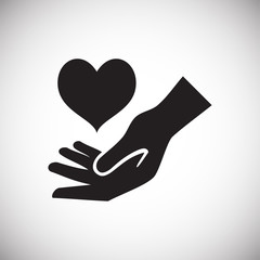 Heart gifting hand on white background icon