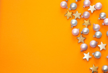 Christmas decorations on orange background. 