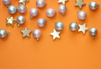 Christmas decorations on orange background. 