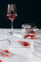 Glasses of red  wine  on white and dark background,  copy space.  Wine degustation concept