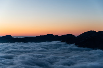 Sunset over sea of fog