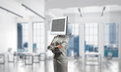 Business woman with monitor instead of head.