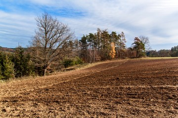 Plowed field. Life on the farm. Agricultural industry. Landscape in the Czech Republic. Autumn in the fields.