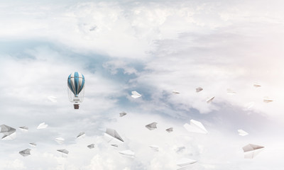 Flying hot air balloon in the air.