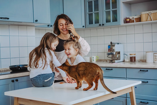 Happy family having fun in the kitchen