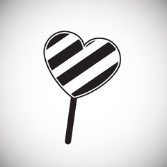 Heart shape candy on white background icon