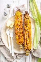 Grilled sweet and salty corncob with butter and salt