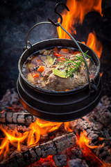 Delicious and fresh hunter's stew with vegetables and herbs
