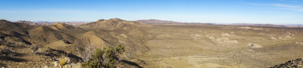 Fototapeta na wymiar Wide Panoramic Landscape Scenic View of Mojave Desert near Lost Horse Mine in Joshua Tree National Park California USA