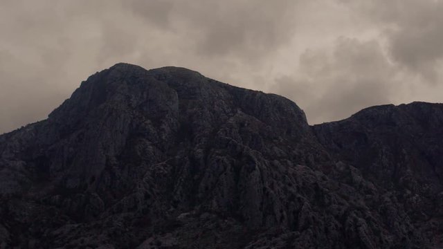 Timelapse - Clouds Float Above The High Beautiful Mountains And Hills Covered With Forest In The Cold Autumn Time