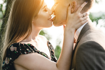 Young couple in love posing on camera