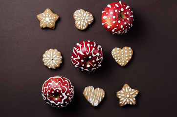 Top view Christmas layout with gingerbread cookies, on a dark background