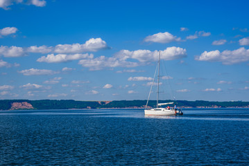 Fototapeta premium White Sailing Boat on the River.