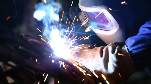 Welder erecting technical steel 