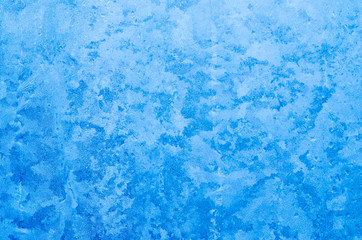 Fototapeta na wymiar Frost texture on a window in winter