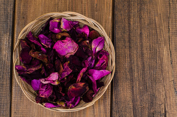 Dry petals of burgundy roses