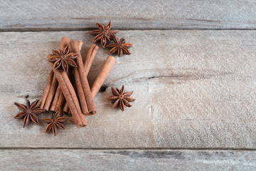 Spices for mulled wine. Cinnamon, star anise on a wooden table.