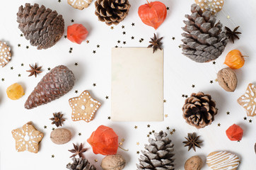 Homemade gingerbread cookies, painted apple. Trendy Christmas, New Year Template, with vintage card for text.