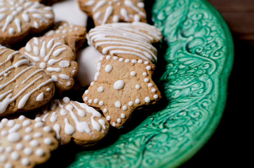 Close-up homemade cookies on a vintage green dish.