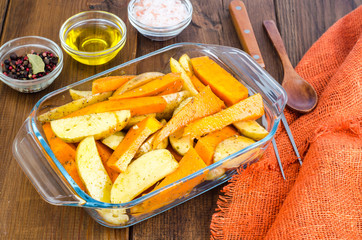 Raw potato and pumpkin slices for baking