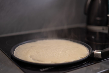 Christmas pancake on a cooker with copy space