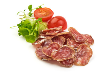 Jerked Sausages from pork with lettuce and tomatoes, isolated on a white background. Close-up