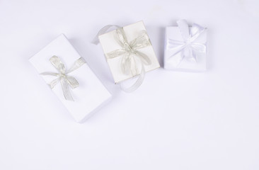 Three gift boxes on white background.