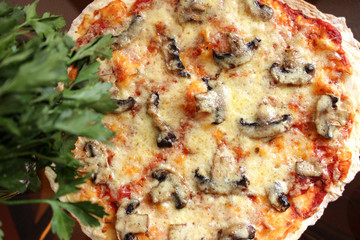 pizza with mushrooms, tomatoes and cheese