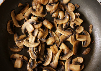 many pieces of fried champignons