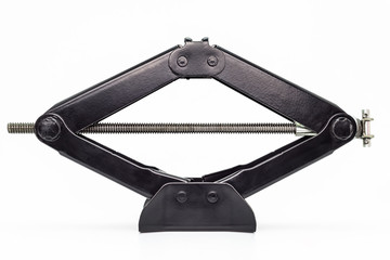 Manual scissor car jack, isolated on a white background with a clipping path.