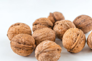 Walnuts on a light background