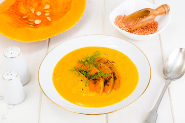 Healthy diet food. Cream soup with lentils and pumpkin