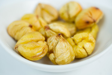 baked chestnut on a white background