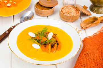Healthy diet food. Cream soup with lentils and pumpkin