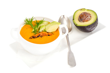 Vegetarian pumpkin soup with avocado