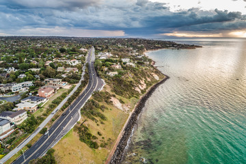 Aerial view of Nepean Highway passing through Oliver's Hill at sunset. Mornington Peninsula,...