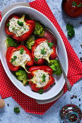 Red paprika stuffed with meat and cheese and spices. Baked stuffed peppers. Top view. Advertising menu.