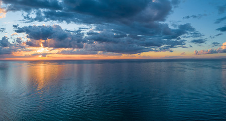 Beautiful sunset over sea - aerial panoramic seascape