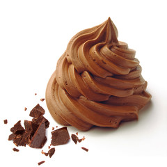 Whipped and swirl formed chocolate cream isolated on white background