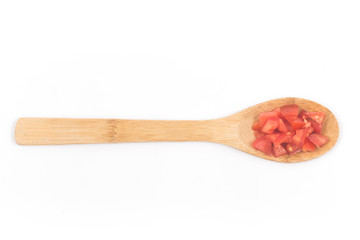 Chopped Tomatoes in a spoon Top view