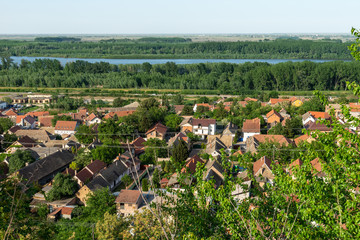 Sremski Karlovci, Serbia - May 2, 2018: Panorama of Sremski Karlovci. Panoramic view of the roofs of the house and Danube river.