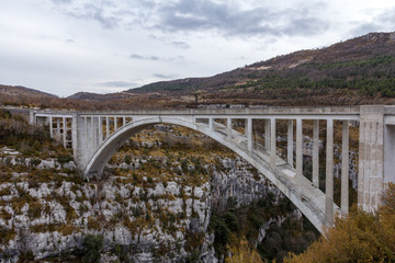 Fototapeta na wymiar The Chauliere Bridge crosses Verdon Gorge on the Artuby River and is an example of an arch type bridge