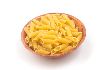 Pasta Penne in a wooden bowl