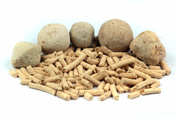 Persian kashk, made from drained sour milk or yoghurt, by forming and letting it dry.